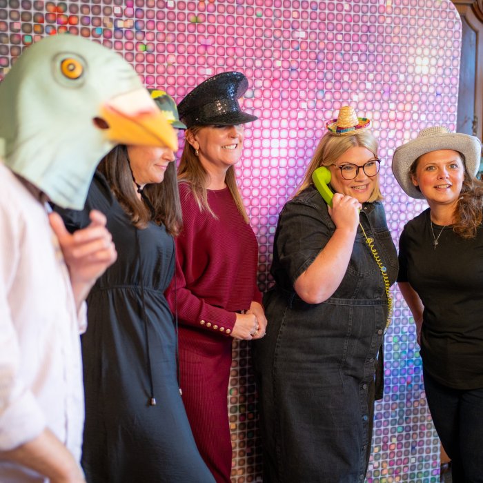 Hiscox staff in a photo booth