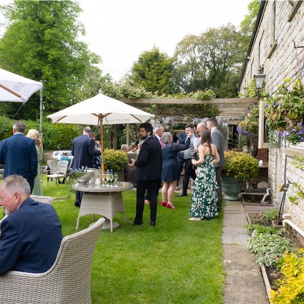 Wedding guests in the garden2