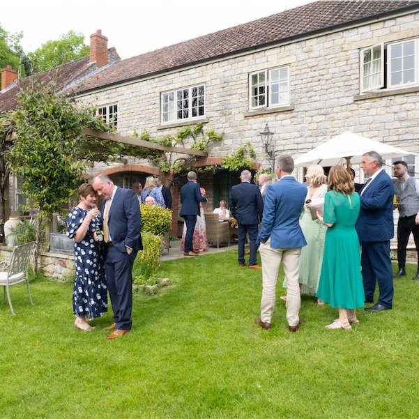 Wedding guests in the garden