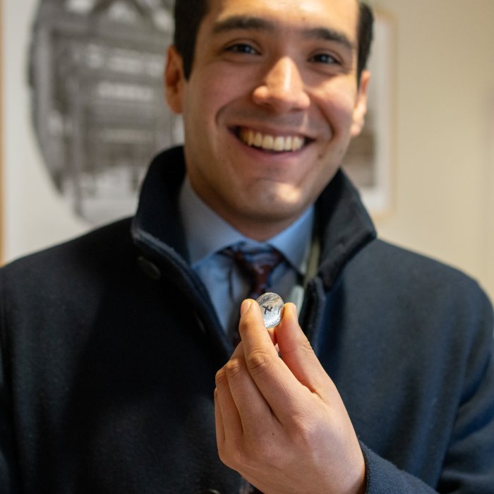 Signed coin that has come out of Nando’s hand